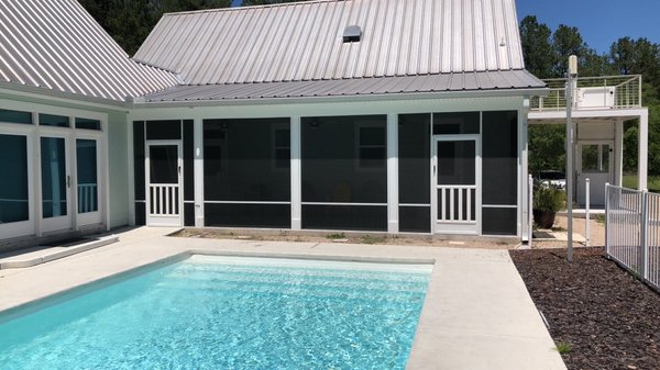 Pool area screen room with a white aluminum fence - This is a Screen room on an existing porch and roof with matching Aluminum fence!!