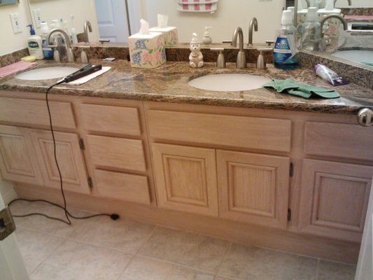 Cabinet Painting - Bathroom cabinets were being updated for old to new and changed of color. Cabinet Painting - Bathroom cabinets were being updated for old to new and changed of color.