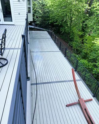 Massive backyard deck replacement - This 1400 square foot deck was no easy project as site location and access was limited and down a steel set of stairs. But we made it happen. Decking chosen was Azek PVC decking in Boardwalk with castle gate border. Massive backyard deck replacement - This 1400 square foot deck was no easy project as site location and access was limited and down a steel set of stairs. But we made it happen. Decking chosen was Azek PVC decking in Boardwalk with castle gate border.