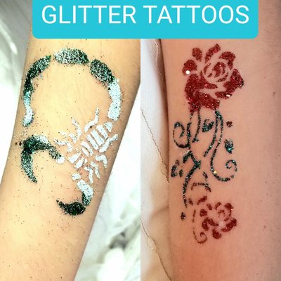 Glitter Tattoos - One of our top covid-safe services is glitter tattoos! These water-proof tattoos last about a week. They can be removed with rubbing alcohol. Glitter Tattoos - One of our top covid-safe services is glitter tattoos! These water-proof tattoos last about a week. They can be removed with rubbing alcohol.