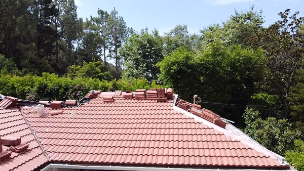 Tile Roof - Tile roofing has several advantages over other roofing materials:
Longevity: Tile roofs can last for 50 years or more, making them a long-lasting option for homeowners.
Durability: Tile roofs are highly resistant to fire, wind, and hail, making them a good choice for areas with harsh weather conditions.
Energy efficiency: Tile roofs reflect more heat than other roofing materials, reducing the amount of heat transferred into the home and helping to reduce energy costs.
Aesthetic appeal: Tile roofs come in a variety of colors, shapes, and styles, making it easy to find one that complements the design of your home.
Low maintenance: Tile roofs require minimal maintenance and are relatively easy to clean.
Tile roofing is heavier than other roofing materials, which may require additional structural support in some cases. But the longevity is second to none. Tile Roof - Tile roofing has several advantages over other roofing materials:
Longevity: Tile roofs can last for 50 years or more, making them a long-lasting option for homeowners.
Durability: Tile roofs are highly resistant to fire, wind, and hail, making them a good choice for areas with harsh weather conditions.
Energy efficiency: Tile roofs reflect more heat than other roofing materials, reducing the amount of heat transferred into the home and helping to reduce energy costs.
Aesthetic appeal: Tile roofs come in a variety of colors, shapes, and styles, making it easy to find one that complements the design of your home.
Low maintenance: Tile roofs require minimal maintenance and are relatively easy to clean.
Tile roofing is heavier than other roofing materials, which may require additional structural support in some cases. But the longevity is second to none.