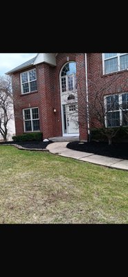 Mulch Installation - Hello all, here we have a project that required bush trimming and spring clean up before proceeding to lay the mulch. After all that was cleared up we laid the black mulch to the beds and gave the house a standing look. Mulch Installation - Hello all, here we have a project that required bush trimming and spring clean up before proceeding to lay the mulch. After all that was cleared up we laid the black mulch to the beds and gave the house a standing look.