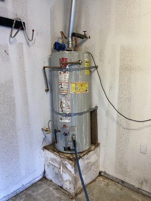 Gas Heater Replacement - An un-noticed slow water leak over several months causing severe damage requiring wall replacement in addition to a new water heater.