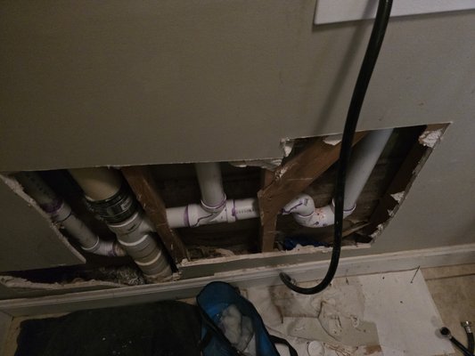 fix a drain leak plus adding a Box drain for the washing machine - leak occurred in the main drain pipe so we had to fix the leak plus remove the washing machine drain and relocate to an appropriate place by adding a drain box, plus connecting the supply water lines fix a drain leak plus adding a Box drain for the washing machine - leak occurred in the main drain pipe so we had to fix the leak plus remove the washing machine drain and relocate to an appropriate place by adding a drain box, plus connecting the supply water lines