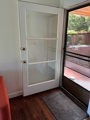 Glass Door Reair - Hello) Here u can see how our handyman repair the glass on the bottom part of the door. He replaced the glass and do small touch ups with painting. We will be happy to help with your projects)