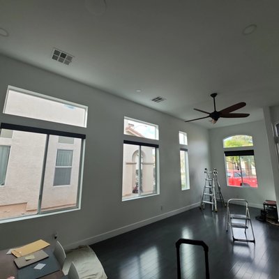 Stainless Steel 35% - Homeowner wanted a window film that complied with HOA regulations- something that wouldn't be too reflective, offered heat rejection, provided privacy, and still allowed natural light into the front room. We achieved that with a film called stainless steel, which features a neutral gray tone. This product is an excellent solution for improving heat transfer without creating a " mirror- like" appearance.