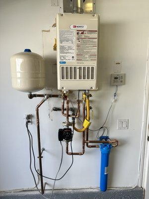 Tankless Water Heater Installation - We upgraded an older Tankless Water Heater to a newer style with more BTU's. Tankless Water Heater Installation - We upgraded an older Tankless Water Heater to a newer style with more BTU's.