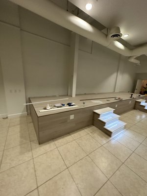 Podium for beauty salon - The pedicure podium was built by Handyman, but the client was very upset with his work because it was not built according to the code. we completely dismantled the podium and rebuilt it, it took one full week to complete the job. We completed the job on time and the client was very satisfied. this project cost him $10,000 including material and labor