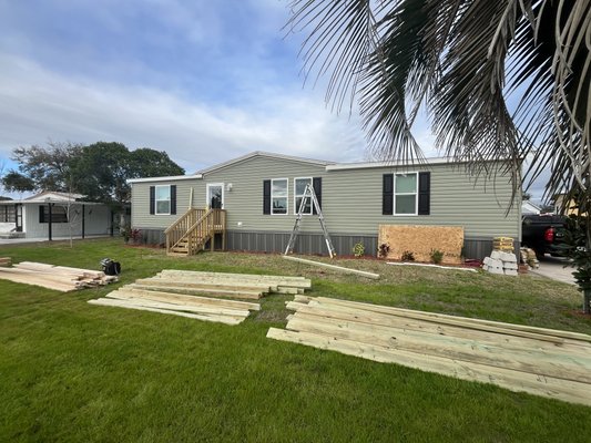 Porch deck - We built a platform with a roof, sewed up the roof, coped in 6 days. The cost of such a project is $10,000 with materials Porch deck - We built a platform with a roof, sewed up the roof, coped in 6 days. The cost of such a project is $10,000 with materials