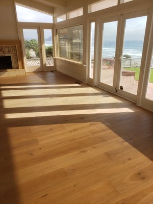 cayucos Beach house (European oak hardwood flooring) - 3200 sqft of Glue down engineered hardwood. European oak, long and wide plank to be exact. Installation of staircase same flooring with cust