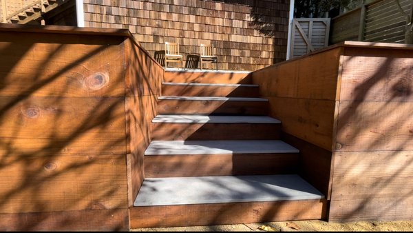 Redwood walls - Front yard hillside transformation, with extra parking on narrow street, and useable space with retaining walls. Redwood walls - Front yard hillside transformation, with extra parking on narrow street, and useable space with retaining walls.
