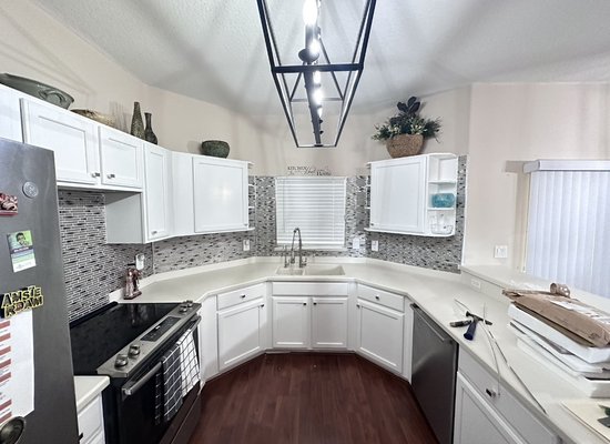 Cabinets painted and back splash instaled - The owner wanted her kitchen renovated and called me for this project in her house and she loved how it end