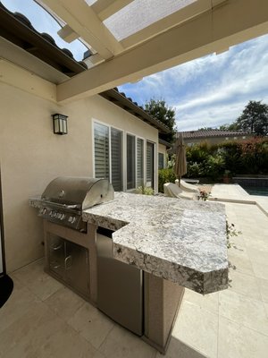 Bbq remodel - This remodel 
Client wanted to get rid of his old outdated tile countertop and wanted to renovated it 
Client did not want to spend a lot but be cost effective and look great 
Here we went with a granite stone and edge profile was 
3 3/4 mittered eased edge
