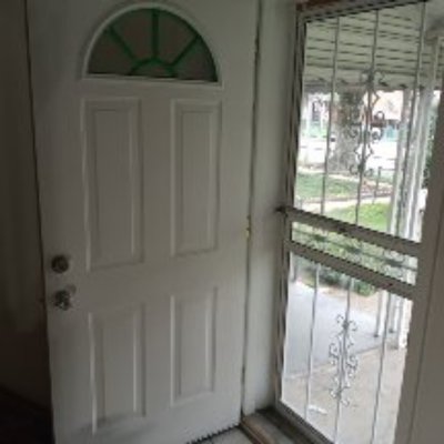 home painting - the front sore was green so I had to paint it with multiple coats to cover it up . then I had to paint the security door . the window sill was rotted out so I repaired that with wood filler