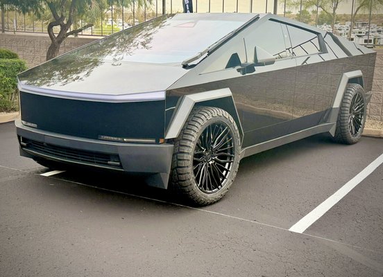 Color PPF Tesla Cybertruck - This was a full color paint protection job done on a Tesla cyber truck. It took three days to complete, cost $5500 and came with a 10 year warrantied, self healing, ceramic coated material which is exponentially more durable than vinyl.