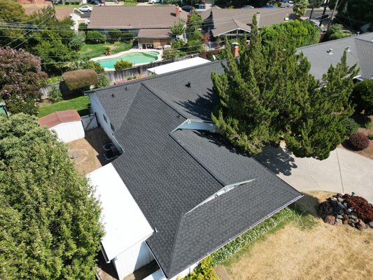 Vacaville Roof & Gutter Installation - Complete Home Protection - This Vacaville roofing project delivered comprehensive exterior protection with a full roof replacement and new gutter system. The home needed both upgrades to ensure proper water management and weather resistance.

We installed premium black architectural shingles that create a bold, modern look while providing superior protection. Our team also installed seamless gutters along the eaves with downspouts to channel water away from the foundation. The sleek black roofing complements the home's exterior and adds striking curb appeal.

The new roof and gutter combination provides reliable, long-lasting protection while maintaining a clean, contemporary appearance. With proper ventilation and drainage now in place, this Vacaville home is prepared for years of worry-free performance.

Need professional roofing and gutter services in Vacaville? Contact us today for your free estimate and experience quality craftsmanship that protects your investment.