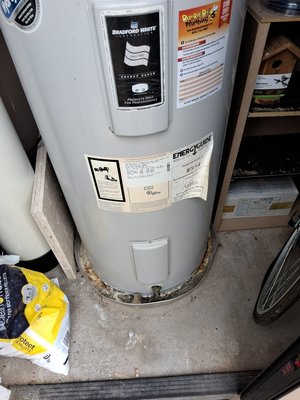 Electric 50-gal water heater - Removing 50-gal electric water heater and installing a new 50-gal electric water heater.