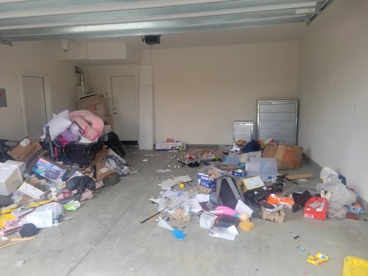 Garage cleanout - This customer had to evict their tenants, and they left a mess in the garage Garage cleanout - This customer had to evict their tenants, and they left a mess in the garage