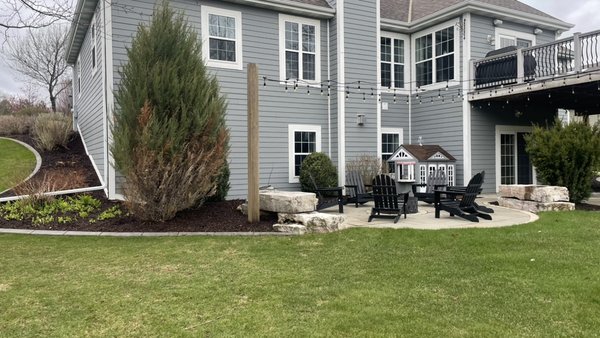 Mulch Installation - A full 3” mulch installation was done on this house for about 23 yards of mulch. We priced about 65/yrd and had the mulch delivered.
