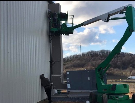 Warehouse Project - This hvac project involved some heavy lifting as we needed a crane to get these units on top of this roof. These units are going to help keep this facility comfortable all year round.