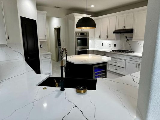 Kitchen Remodel - In these before and after photos, we showcase a remarkable kitchen transformation that embodies modern luxury. The customer's vision of revamping their outdated kitchen has been masterfully realized. The space now boasts sleek, contemporary design elements and high-end features that exude opulence. From gleaming countertops to state-of-the-art appliances, this kitchen stands as a testament to the fusion of elegance and functionality, making it a stellar addition to our Yelp portfolio.