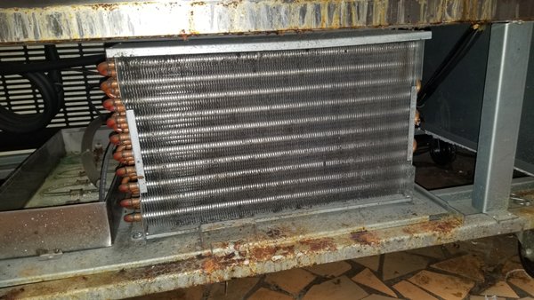 The freezer had issue with temperature controller - The freezer had very low cooling temperature and really dusty condenser coil. After replacing temperature controller and service for the condenser coil, the freezer start cooling properly