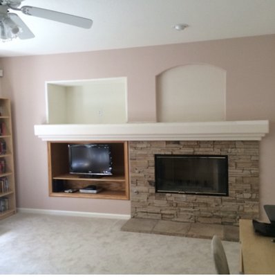 TV insert & arch removal - Removed bullnose edges, framed open space and arch to be flush with existing wall. Painted corner to corner. TV insert & arch removal - Removed bullnose edges, framed open space and arch to be flush with existing wall. Painted corner to corner.