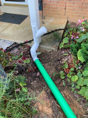 Downspout Discharge Lines - This home was experiencing water intrusion during heavy rains. Given there was a finished bathroom along the wall of concern, our first course of action was to ensure that all water was being diverted away from the foundation. After doing the downspouts, we will have the customer monitor the issue to see if there is no longer water intrusion. Waterproofing can be a multi step approach, it doesn't always have to mean completely destroying your basement or yard, lets take care of the basics first! Downspout Discharge Lines - This home was experiencing water intrusion during heavy rains. Given there was a finished bathroom along the wall of concern, our first course of action was to ensure that all water was being diverted away from the foundation. After doing the downspouts, we will have the customer monitor the issue to see if there is no longer water intrusion. Waterproofing can be a multi step approach, it doesn't always have to mean completely destroying your basement or yard, lets take care of the basics first!