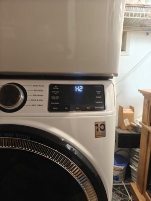 GE Washer Front Load - Ge Washer stop working properly...H2O water supply error code 
Also Detergent/Softener Not Dispensing from the tray
Common problem of these issues is a faulty Inlet Valve assembly that need to be replace
After replacement can notice the washer advance in a cycle as it should.