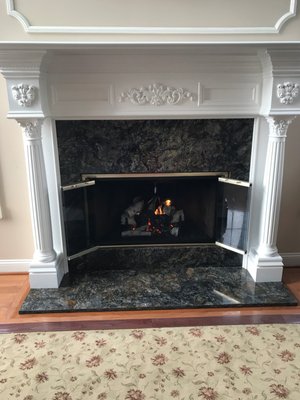 Fireplace Project: Titanium Black - A mantle with this much character needed a gorgeous stone to complete the bold look our client was trying to achieve! Well Titanium Black Granite sure stole the show! Granite isn’t just for kitchen and bathroom projects! Fireplace Project: Titanium Black - A mantle with this much character needed a gorgeous stone to complete the bold look our client was trying to achieve! Well Titanium Black Granite sure stole the show! Granite isn’t just for kitchen and bathroom projects!