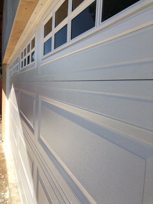 Ranch Panel Garage Door with Windows - The homeowner wanted to add value to her home whilst adding savings to her energy bill. She opted for this CHI Overhead Door model 4251 insulated garage door with Stockton Window Design in White. We also installed a LiftMaster garage door opener. Ranch Panel Garage Door with Windows - The homeowner wanted to add value to her home whilst adding savings to her energy bill. She opted for this CHI Overhead Door model 4251 insulated garage door with Stockton Window Design in White. We also installed a LiftMaster garage door opener.