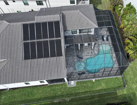 Solar Pool Heater in Naples, FL - Solar pool heating panels installed on a 2-story roof in Naples, FL in less than 1 day.