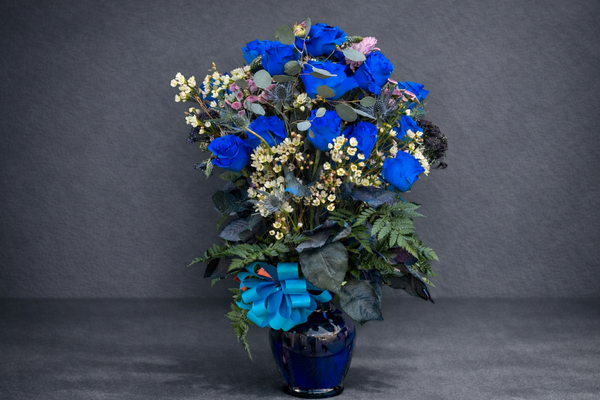 Midnight moon - Midnight moon bouquet was a made to order bouquet, custom designed using rich blue roses, and complementary blooms for a dramatic elegant look. Midnight moon - Midnight moon bouquet was a made to order bouquet, custom designed using rich blue roses, and complementary blooms for a dramatic elegant look.