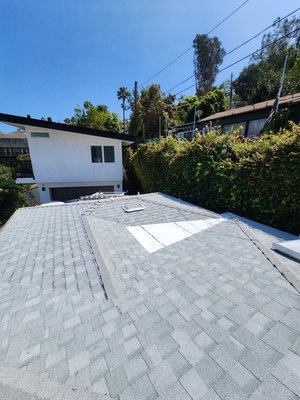 Asphalt Shingle Roof System Encino CA - another happy Customer and peace of mind having a new roof system to protect his belongings and making a beautiful cosmetic looking