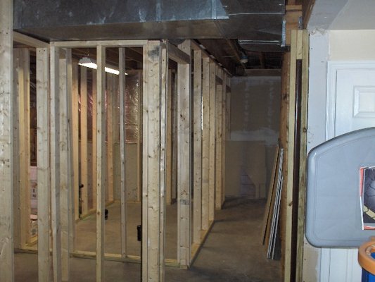 Basement Remodeling - Basements have long been relegated to storage spaces, laundry rooms, or unused dungeons beneath our homes. However, in recent years, homeowners have started to recognize the untapped potential that these subterranean spaces offer. Basement remodeling has become a popular trend, transforming dingy basements into inviting living areas known as finished basements. In this article, we’ll explore the benefits, design possibilities, and considerations of basement remodeling, turning these forgotten spaces into valuable extensions of your home.Increased Living Space: One of the most significant advantages of basement remodeling is the expansion of usable living space. A finished basement effectively increases your home’s square footage, providing room for various purposes like a family room, home theater, office, gym, or guest suite. This additional space can be a game-changer for families looking to accommodate growing needs without moving to a larger home.
Enhanced Property Value: A well-executed basement renovation can substantially increase the resale value of your home. Potential buyers are often drawn to finished basements, recognizing the added functionality and aesthetic appeal they bring to a property. This makes basement remodeling a smart investment.
Improved Energy Efficiency: Insulating and finishing your basement can help regulate temperature and reduce energy costs. Proper insulation ensures that your finished basement remains comfortable year-round, as it becomes an integral part of your home’s thermal envelope.
Personalization and Versatility: Basement remodeling allows homeowners to tailor the space to their specific needs and style preferences. Whether you desire a cozy entertainment area, a bright and open home office, or a tranquil retreat, your basement can be customized to suit your vision.The design possibilities for a finished basement are virtually endless. Here are some popular ideas to consider:
Home Theater: Transform your basement into a cinematic paradise with a state-of-the-art home theater system, comfortable seating, and soundproofing for an immersive movie-watching experience.
Family Room: Create a cozy family gathering spot with comfortable seating, a fireplace, and built-in shelving for storage and display.
Home Gym: Dedicate a portion of your basement to fitness equipment, mirrors, and rubber flooring for a private workout space.
Guest Suite: Turn your basement into a welcoming guest suite with a bedroom, bathroom, and sitting area, perfect for hosting friends and family.
Home Office: Design a tranquil and productive workspace with ample natural light and efficient storage solutions.
Playroom: If you have children, consider creating a dedicated play area complete with games, toys, and plenty of storage.
Considerations for Basement Remodeling
Before embarking on a basement remodeling project, there are several important considerations:

Moisture Control: Basements are prone to moisture issues. Proper drainage, waterproofing, and ventilation are essential to prevent mold and mildew growth.

Hire a professional to help: Quality Expectations can help you at every stage of your basement remodeling project, including helping with regulations and permits required for basement remodeling in your area.

Lighting: Basements often lack natural light. Plan for adequate artificial lighting, including task lighting and ambient lighting, to create a comfortable and inviting atmosphere.

Structural Integrity: Ensure that your basement’s structure is sound and can support the intended use of the space. Consult with a structural engineer if necessary.

Basement remodeling and finished basements have emerged as transformative home improvement projects that unlock hidden potential and add substantial value to your home. By carefully planning, addressing moisture concerns, adhering to building codes, and exploring design possibilities, you can create a finished basement that enhances your lifestyle and your property’s worth. Don’t let your basement remain an underutilized space; instead, let Quality Expectations help turn it into a valuable extension of your home.