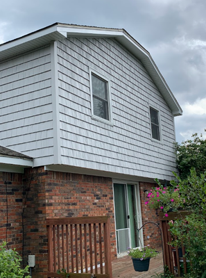 Siding Replacement in Carmel, Indiana - We completely replaced the damaged siding and trim surrounding for this home owner in Carmel. They went from the old stucco look to insulated vinyl shake siding. Siding Replacement in Carmel, Indiana - We completely replaced the damaged siding and trim surrounding for this home owner in Carmel. They went from the old stucco look to insulated vinyl shake siding.