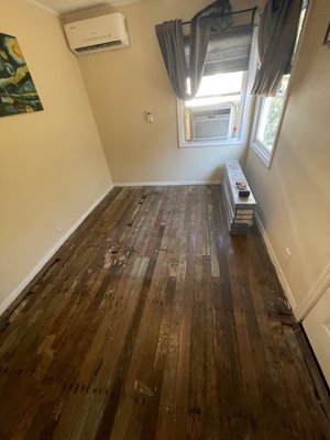 Big Chris - On this job site customer provide 12 mm flooring with attached underlayment .
Before we started installation we fixed subfloor , replace some wood planks with 5/8 plywood . 
Budged for labor was less then a 1000.