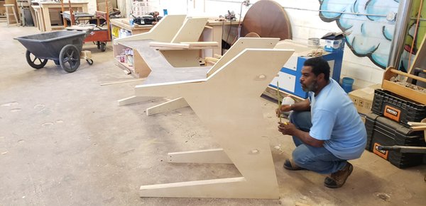 Custom studio desk￼ - This was a custom studio desk build , The design was given to us by the customer and we were asked to duplicate the design, The design was slightly altered to make it a one-of-a-kind creation￼￼￼