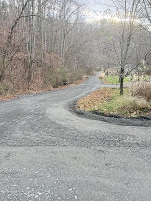 Full Driveway Repair - This driveway had taken years of wear and tear with no maintenance—no road agreement meant it was long overdue for a rebuild. Once our client brought us out, we got straight to work.

We brought in 210 tons of ABC-M to reconstruct the entire 1/8-mile stretch from the ground up. The goal wasn’t just to fix it, but to build something that will hold up for the long haul. We worked closely with the homeowner to create a long-term plan that keeps both them and their neighbors from having future issues.

We also cleared out heavy brush and trees along the sides to widen the road, prevent vehicle scratches, and improve overall accessibility.

If your driveway needs a complete overhaul or routine maintenance, we’ve got you covered—start to finish.