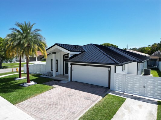 From Tiles to METAL ROOF - This home has the original tiles from the property was built. it had al the tiles installed with screws letting the water pass through them into the attic space. Homeowners decided to get the strongest roof money can buy and protect their home from high winds and heavy rains. From Tiles to METAL ROOF - This home has the original tiles from the property was built. it had al the tiles installed with screws letting the water pass through them into the attic space. Homeowners decided to get the strongest roof money can buy and protect their home from high winds and heavy rains.