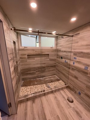 Barndoor-Style Shower Enclosure - We now offer exclusive finishes in barndoor-style shower enclosures. Chrome, Brushed Nickel, Matte Black, Rose Gold, and Gun Metal. These elegant and functional shower enclosures are the perfect complement for your newly-tiled shower. Barndoor-Style Shower Enclosure - We now offer exclusive finishes in barndoor-style shower enclosures. Chrome, Brushed Nickel, Matte Black, Rose Gold, and Gun Metal. These elegant and functional shower enclosures are the perfect complement for your newly-tiled shower.