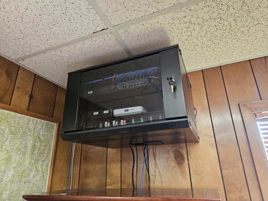 City of Reklaw - The City of Reklaw had outdated networking equipment and wiring, so they reached out to us for an upgrade. We replaced their old cabling with Cat6 wiring and added a second line to each network port, giving them plenty of connectivity for years to come. Every cable was terminated and certified, ensuring it meets our quality standards and can handle heavy demands well into the future.
Previously, their networking equipment was sitting on top of a cabinet with wires running everywhere. We installed a professional network rack to organize the system, house the new equipment, and give it a clean, reliable setup.
With this new network in place, Reklaw is now equipped to handle the demands of today—and the growth of tomorrow. City of Reklaw - The City of Reklaw had outdated networking equipment and wiring, so they reached out to us for an upgrade. We replaced their old cabling with Cat6 wiring and added a second line to each network port, giving them plenty of connectivity for years to come. Every cable was terminated and certified, ensuring it meets our quality standards and can handle heavy demands well into the future.
Previously, their networking equipment was sitting on top of a cabinet with wires running everywhere. We installed a professional network rack to organize the system, house the new equipment, and give it a clean, reliable setup.
With this new network in place, Reklaw is now equipped to handle the demands of today—and the growth of tomorrow.