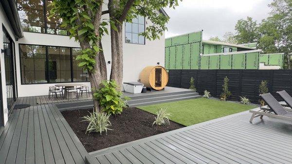 Downtown Austin Project - Here's an awesome transformation we completed at our Downtown Austin project. We layered the composite decking and artificial turf areas to create contrast in color and terrace heights. This helped form a design that is simple, practical and attention-grabbing. The sauna and cold-plunge combo brought the functionality of this space to the next level. Downtown Austin Project - Here's an awesome transformation we completed at our Downtown Austin project. We layered the composite decking and artificial turf areas to create contrast in color and terrace heights. This helped form a design that is simple, practical and attention-grabbing. The sauna and cold-plunge combo brought the functionality of this space to the next level.