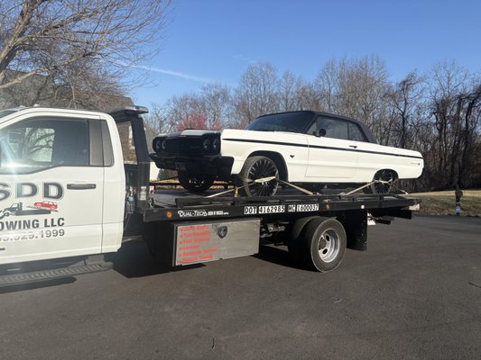 Flatbed Towing - We offer flatbed towing across multiple vehicles, Call us today for immediate assistance 703.929.1999