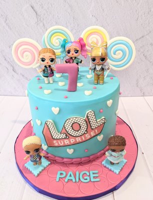 L.O.L. Surprise Dolls Cake - A beautiful chocolate cake with vanilla buttercream filling. Decorated with homemade marshmallow fondant.