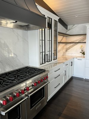 Custom Cabinetry and Renovations - This was a remodel done in Laguna Beach to an older house. There were walls demolished and an unbelievable transformation took place. I was thankful to be a part of the process with custom cabinet accents, bar shelving brackets, and handrails.