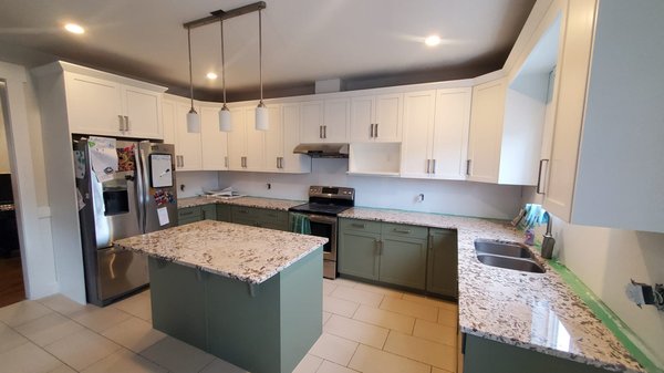Cabinets refinishing - If you’re considering hiring a painting company to have your kitchen cabinets professionally painted, ensure you do thorough research and hire a reputable company. It will cost you less money to do it right the first time than to do it over.
There are a lot of painting contractors out there that claim they can paint cabinets. The fact is that the majority don’t have the knowledge, patience, or skills to paint them properly. When the job is done right, and all the necessary steps are followed, painted cabinets can last a very long time. We spray-paint the doors and drawers in our portable spray booth that we install in the customer's garage. The size of the booth is 13’X 8’. For the cabinet frames and sides that remain in the house, we offer the option to either get a brush and roll with 6 mm fine-finish or have them spray painted for a factory finish look. The product we use for the topcoat is both strong and durable and will stand up to everyday wear and tear.
The process of painting kitchen cabinets is meticulous and time-consuming. We complete an average kitchen in about 2 to 3 business days. It takes up to 30 days for the paint to fully cure and achieve its proprieties, and during this period you will have to be extra careful around the cabinets.
We also offer 3 years warranty. Cabinets refinishing - If you’re considering hiring a painting company to have your kitchen cabinets professionally painted, ensure you do thorough research and hire a reputable company. It will cost you less money to do it right the first time than to do it over.
There are a lot of painting contractors out there that claim they can paint cabinets. The fact is that the majority don’t have the knowledge, patience, or skills to paint them properly. When the job is done right, and all the necessary steps are followed, painted cabinets can last a very long time. We spray-paint the doors and drawers in our portable spray booth that we install in the customer's garage. The size of the booth is 13’X 8’. For the cabinet frames and sides that remain in the house, we offer the option to either get a brush and roll with 6 mm fine-finish or have them spray painted for a factory finish look. The product we use for the topcoat is both strong and durable and will stand up to everyday wear and tear.
The process of painting kitchen cabinets is meticulous and time-consuming. We complete an average kitchen in about 2 to 3 business days. It takes up to 30 days for the paint to fully cure and achieve its proprieties, and during this period you will have to be extra careful around the cabinets.
We also offer 3 years warranty.