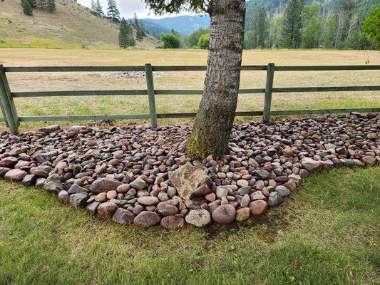 rock landscape area - My client asked me for some labor help after I helped him reclaim his picnic area down by the creek on his property. This is just part of the project as he needed to order more rock. As he only needed an extra hand, I charged him a flat hourly rate. rock landscape area - My client asked me for some labor help after I helped him reclaim his picnic area down by the creek on his property. This is just part of the project as he needed to order more rock. As he only needed an extra hand, I charged him a flat hourly rate.