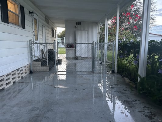 100' Chainlink Fence and Gate - This homeowner requested a secure, enclosed area for their dogs to freely move in the yard and carport. We successfully installed durable Galvanized Chain-link fence posts into the concrete of the carport, ensuring a robust gate that will withstand frequent use for many years. 100' Chainlink Fence and Gate - This homeowner requested a secure, enclosed area for their dogs to freely move in the yard and carport. We successfully installed durable Galvanized Chain-link fence posts into the concrete of the carport, ensuring a robust gate that will withstand frequent use for many years.