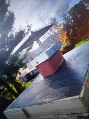 Chimney crown with energy saving damper - This family had water penetrating the house, upon inspection there was no chimney crown preventing water to shed away from the chimney. We installed a 4 inch thick concrete crown with a 4 inch over hang and installed a 9x13 flue tile with an energy saving damper. Which will help prevent loss of heat, prohibits leaves animals and debris from entering into the chimney. Chimney crown with energy saving damper - This family had water penetrating the house, upon inspection there was no chimney crown preventing water to shed away from the chimney. We installed a 4 inch thick concrete crown with a 4 inch over hang and installed a 9x13 flue tile with an energy saving damper. Which will help prevent loss of heat, prohibits leaves animals and debris from entering into the chimney.